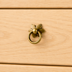 Poignée "Fleur" avec anneau...